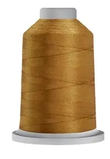 Oppdag Glide 40wt (1000 m) – den ultimate trilobale polyestertråden for quilting, broderi og dekorsøm. Med sin fantastiske glans og høye bruddstyrke får du et feilfritt resultat hver eneste gang!